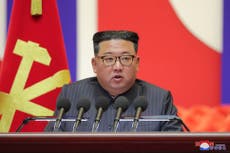 N. Korea sees suspected COVID-19 cases after victory claim
