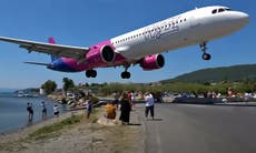 Tourists stunned as Wizz Air jet skims their heads on Greek beach