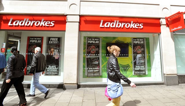 The finance boss of Ladbrokes and Coral owner Entain has said people are staying at home amid the cash crisis (John Stillwell/PA)