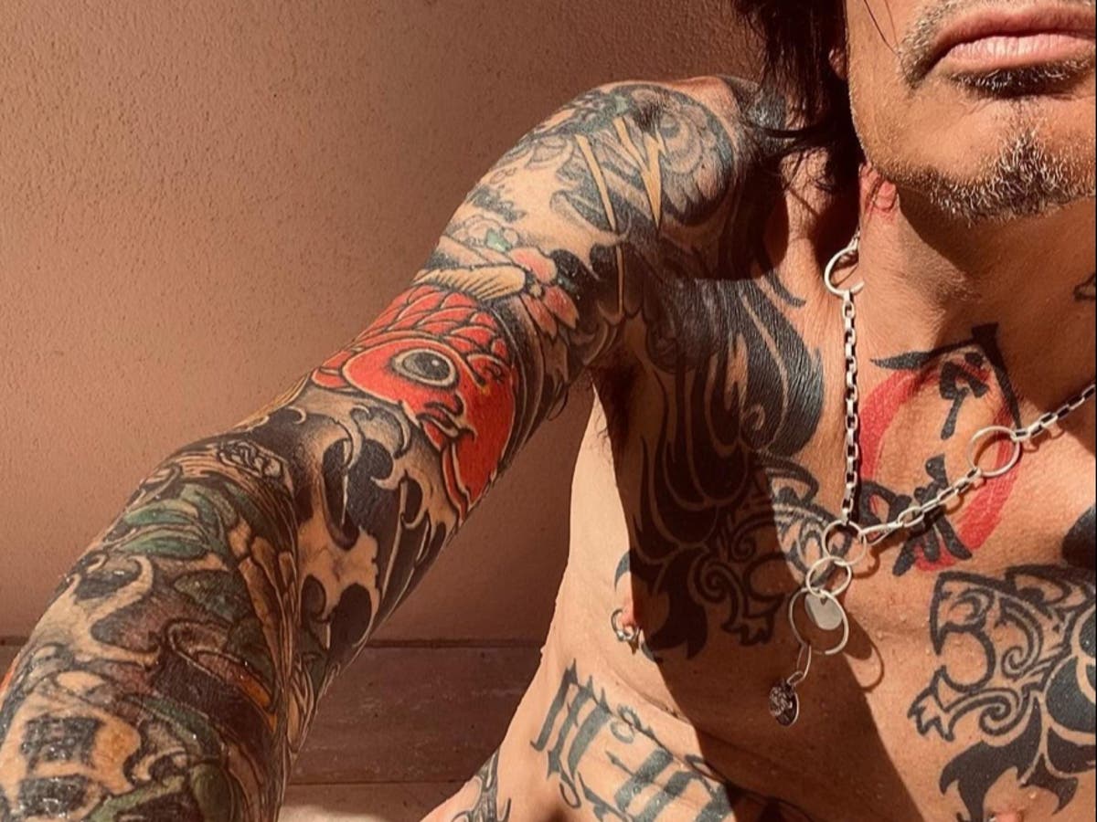 Tommy Lee shocks fans with NSFW full-frontal nude photo on Instagram.