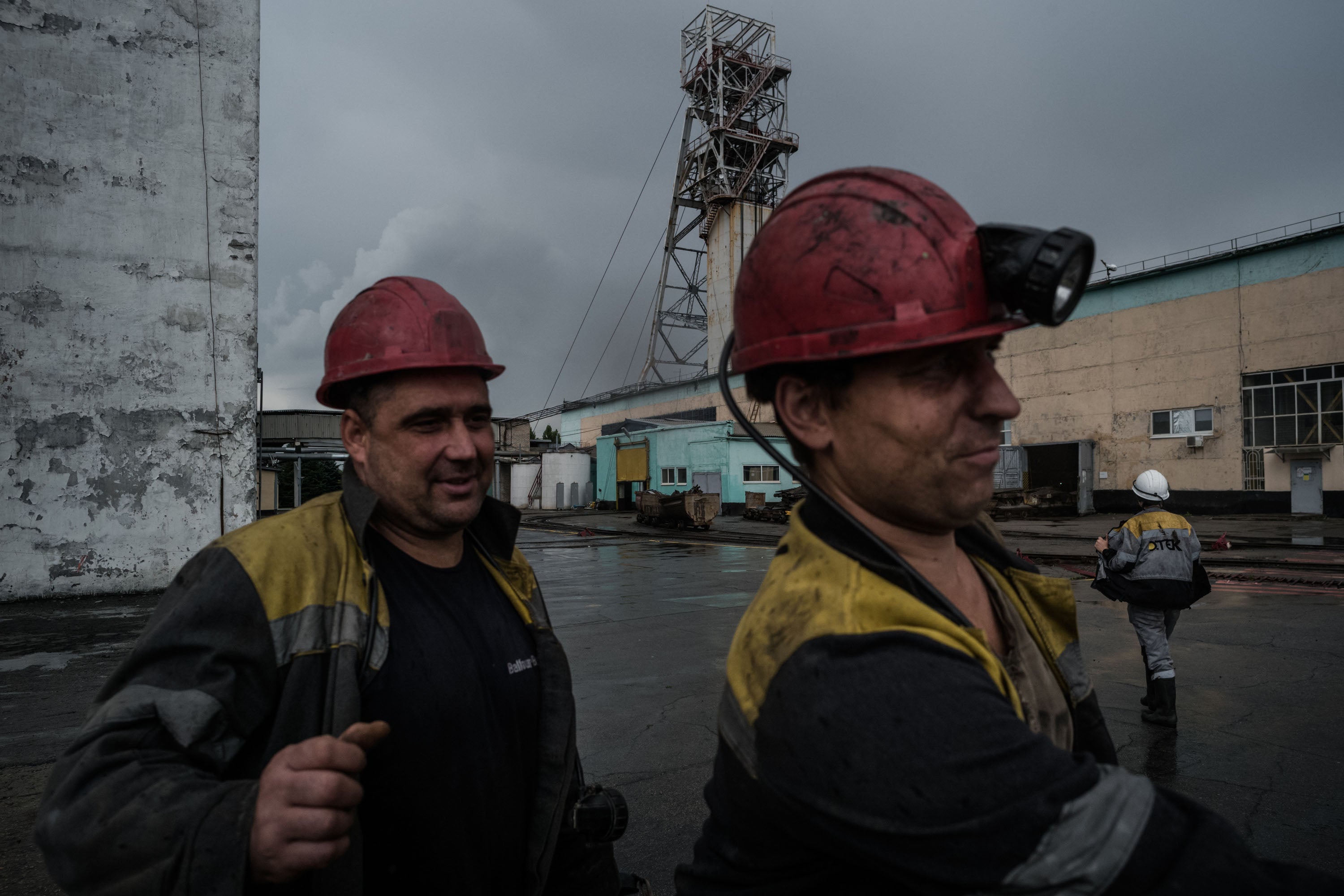 Ukrainian miners surface from 1,200ft underground