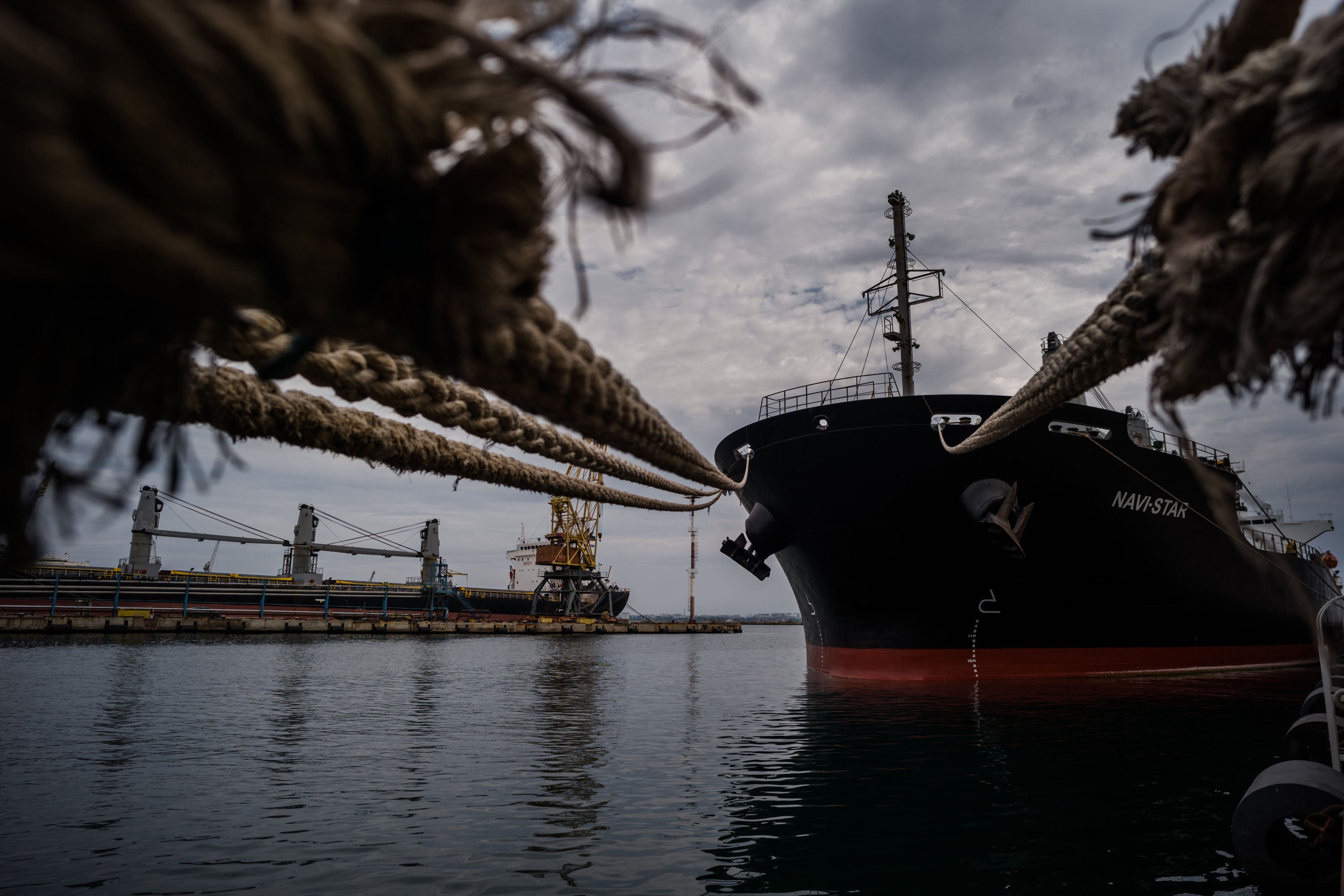 A ship carrying grain waits in port in Odessa