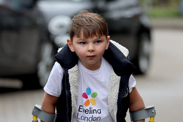 Tony Hudgell, who uses prosthetic legs, takes the final steps in his fundraising walk in West Malling Kent. Five-year-old Tony has raised more than �1,000,000 for the Evelina London Children’s Hospital, who have cared for him since he was four-months-old, by walking every day in June, covering a distance of 10 kilometres.