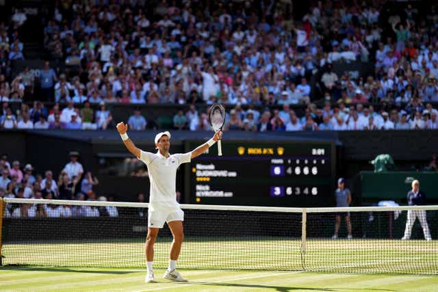 Novak Djokovic celebrates victory over Nick Kyrgios in the Wimbledon final (Zac Goodwin/PA)
