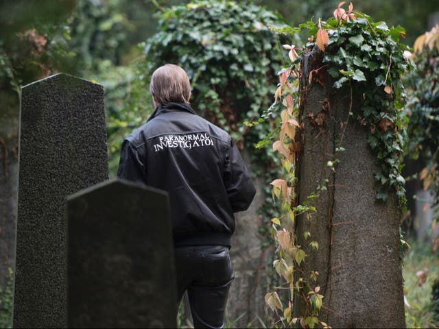 <p>‘Paranormal Investigator’ Dominik Creazzi from Vienna Ghosthunters looks for paranormal activity at Vienna Central Cemetery on 20 October 2016</p>