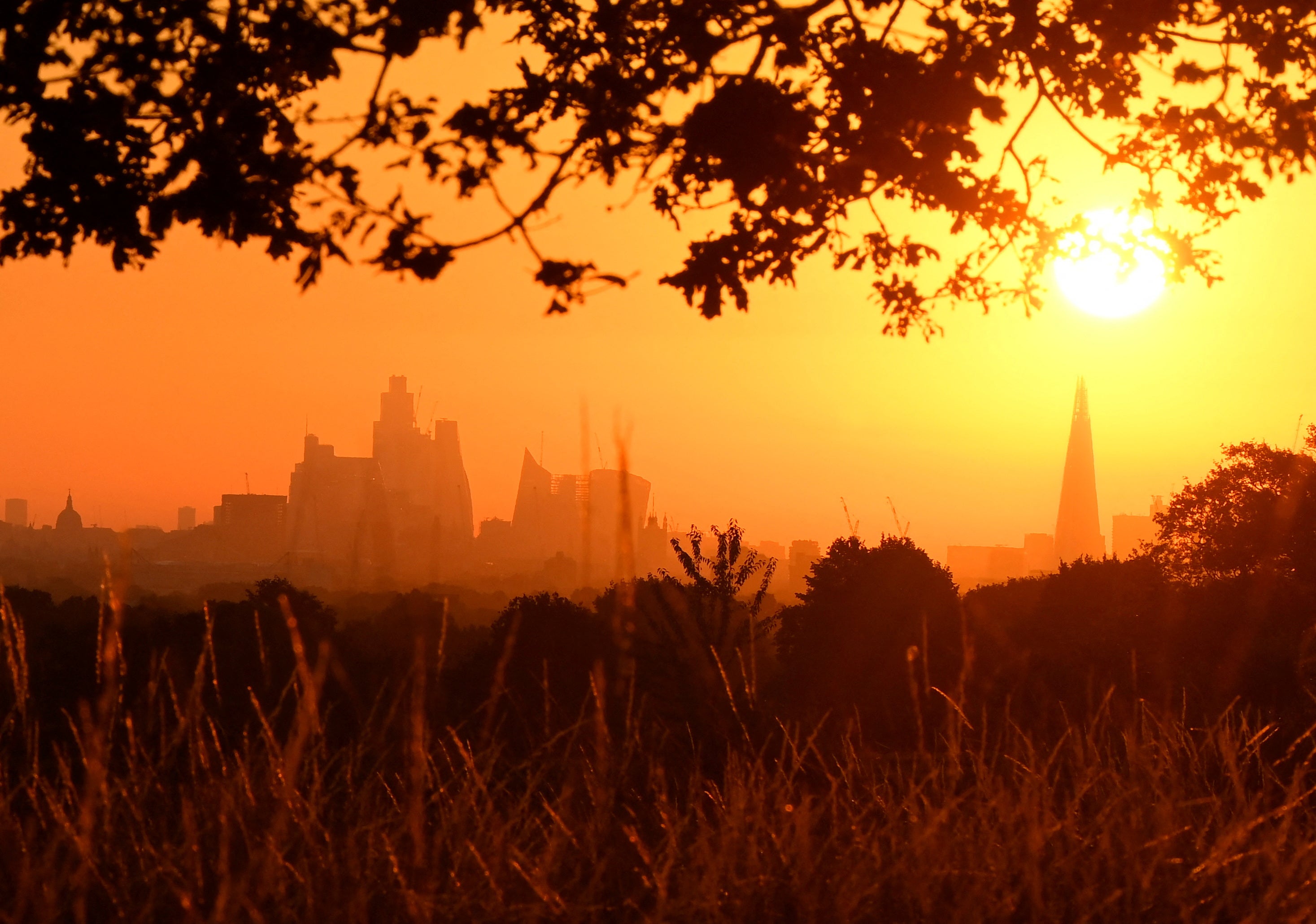 The sun rises above the London skyline, as a second heatwave is predicted for parts of the country