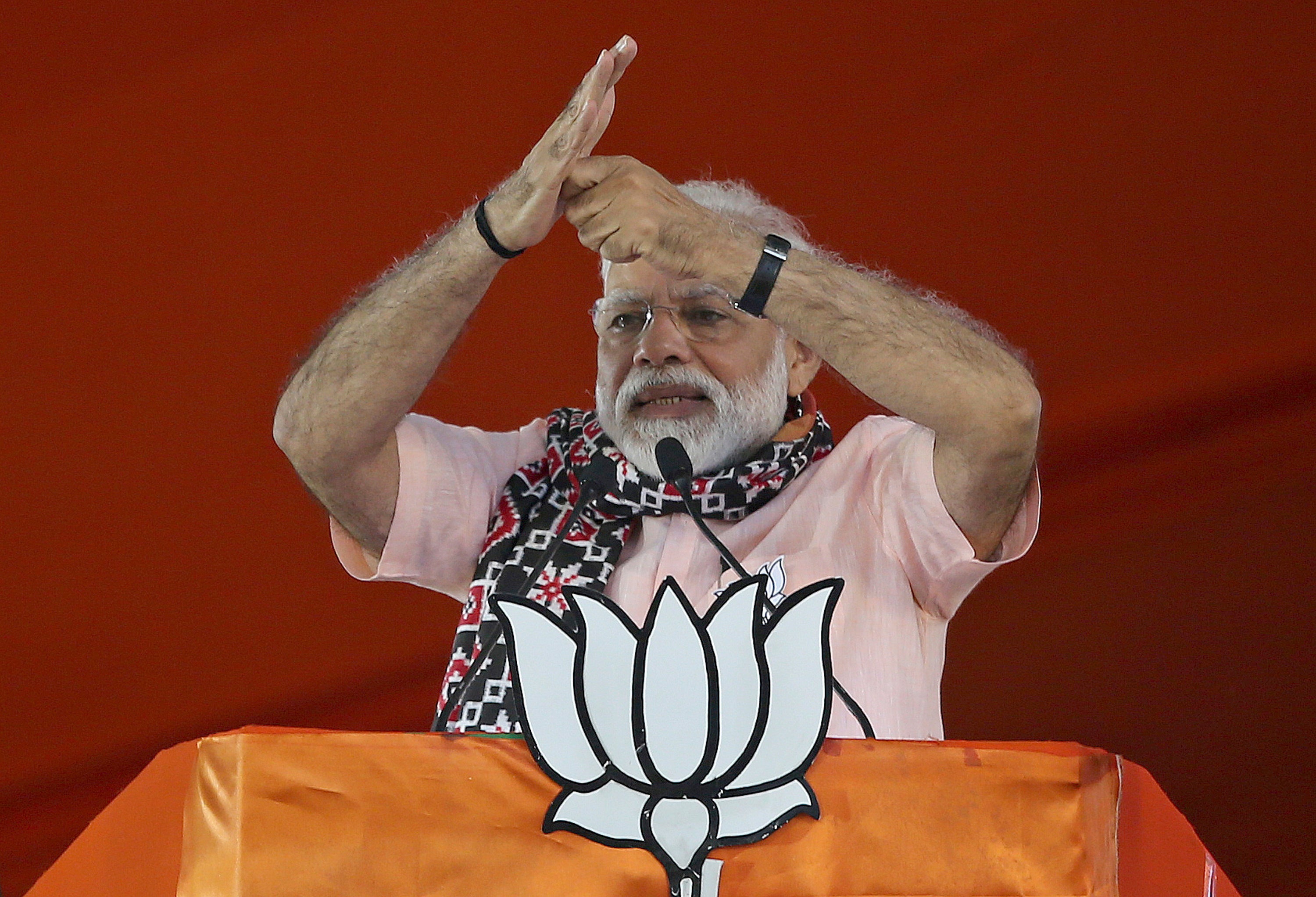 Indian Prime Minister Narendra Modi gestures as he speaks during an election campaign rally of his Bharatiya Janata Party (BJP)