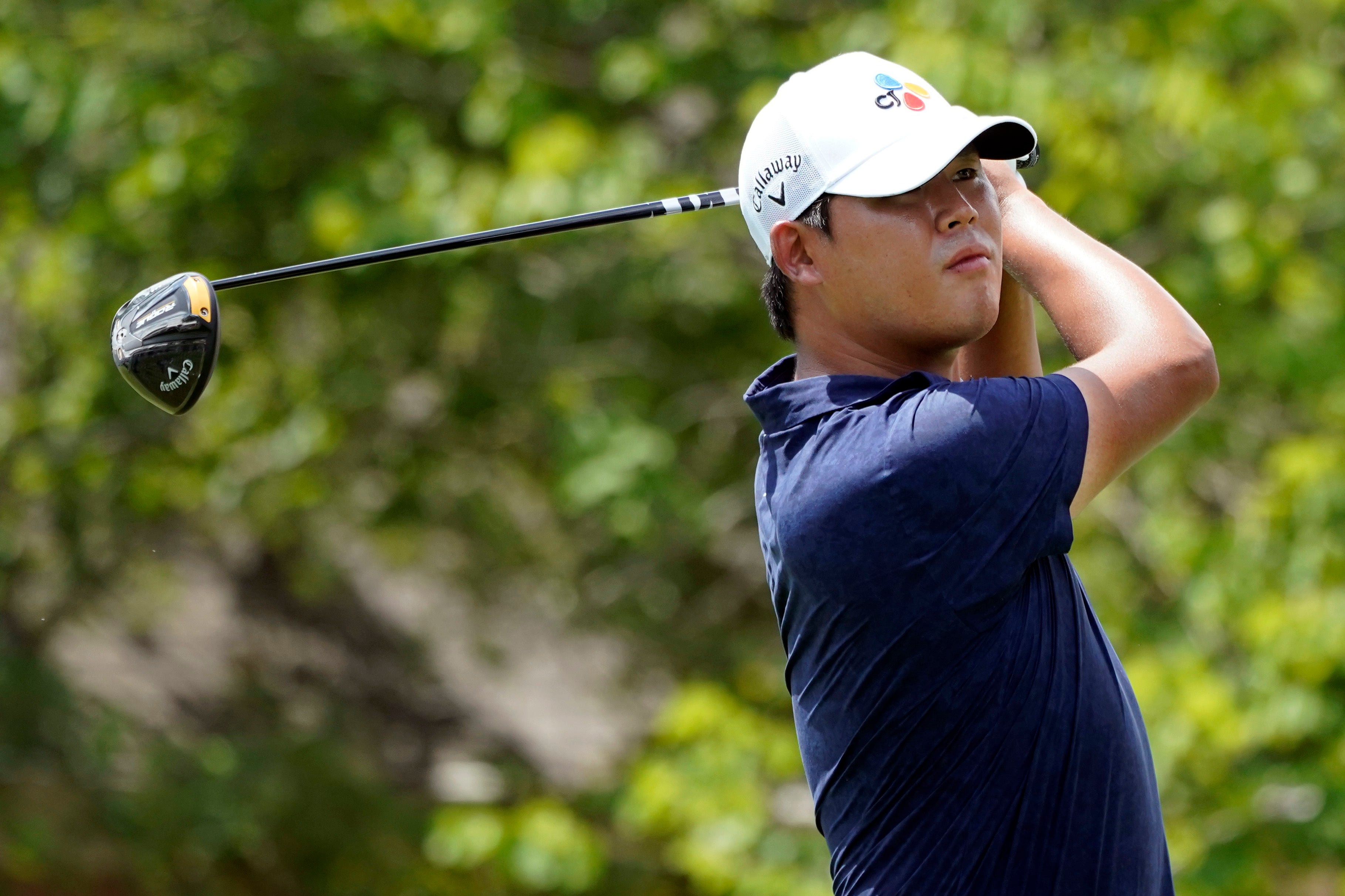 Si Woo Kim marked a strong start to the FedEx Cup play-offs with an eagle as he carded an eight-under 62 and snatched a share of the lead with JJ Spaun (Mark Humphrey/AP)