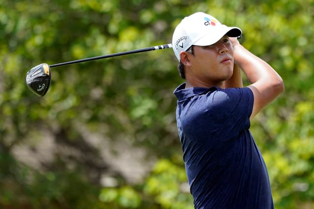 Si Woo Kim marked a strong start to the FedEx Cup play-offs with an eagle as he carded an eight-under 62 and snatched a share of the lead with JJ Spaun (Mark Humphrey/AP)