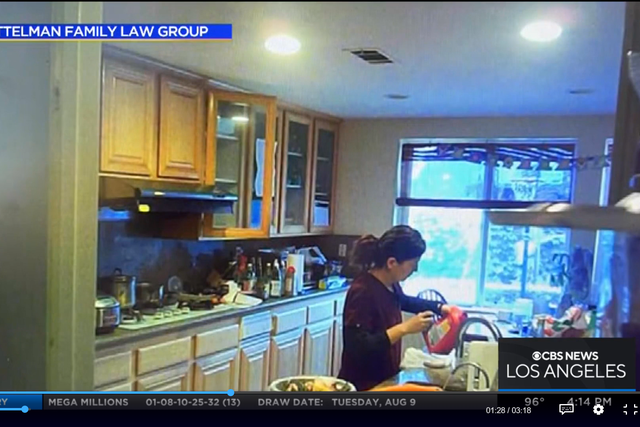 <p>A screengrab from a hidden camera shows dermatologist Yue Emily Yu allegedly spiking her husband’s lemonade </p>