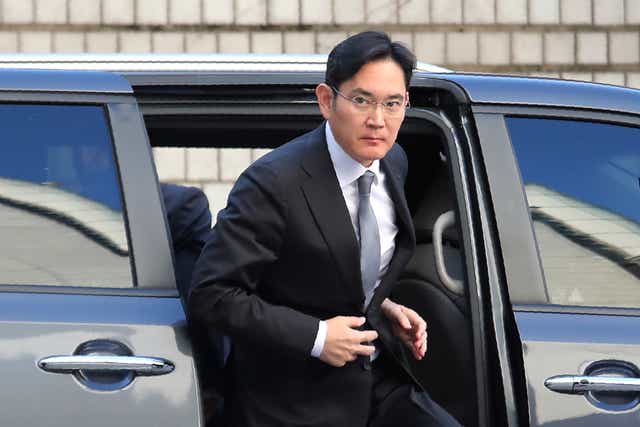<p>File: Samsung heir Lee Jae-yong gets out of a car at the Seoul High Court in Seoul, South Korea on 22 November 2019 </p>
