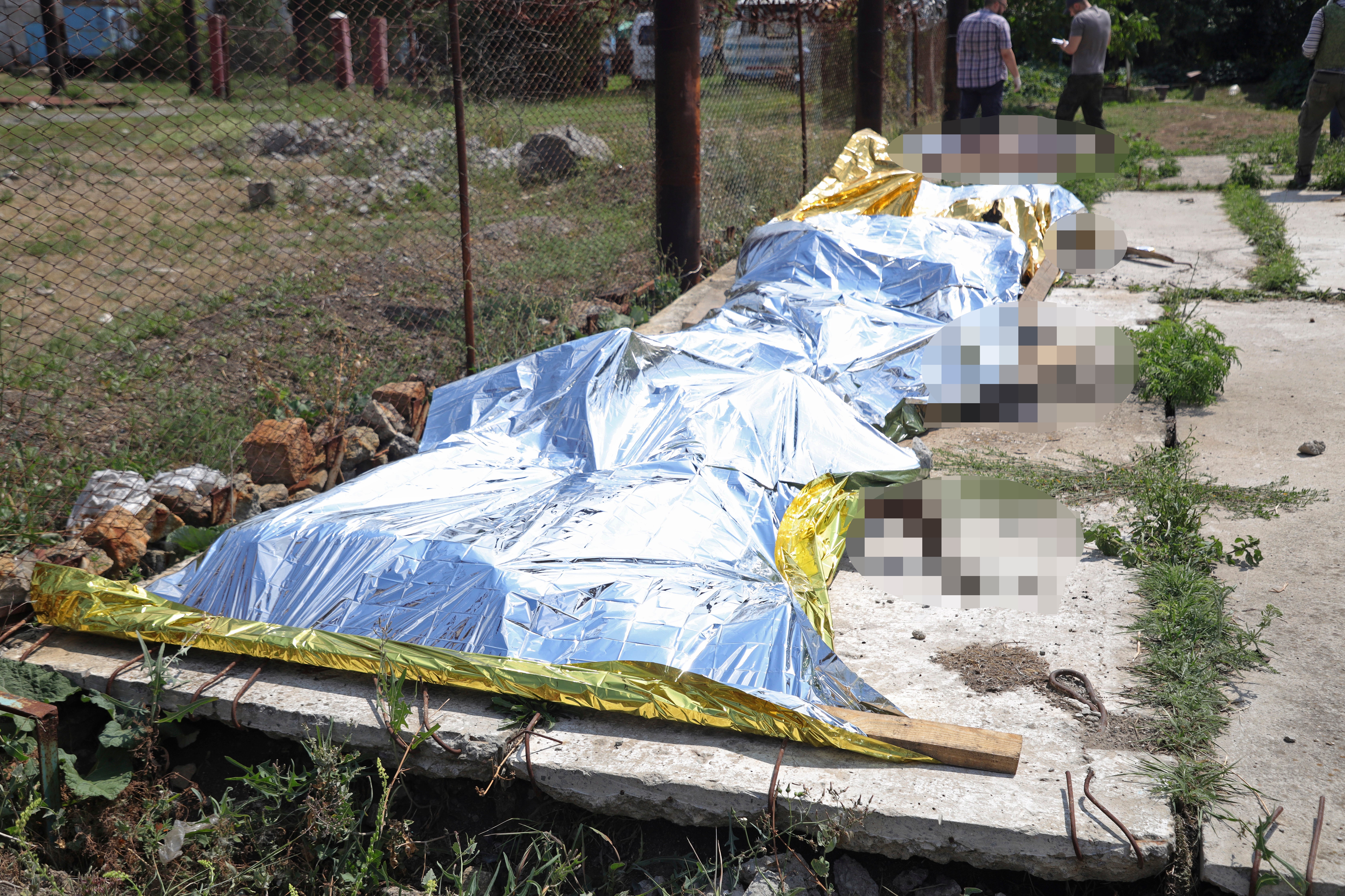 Investigators examine bodies of Ukrainian military prisoners at Olenivka