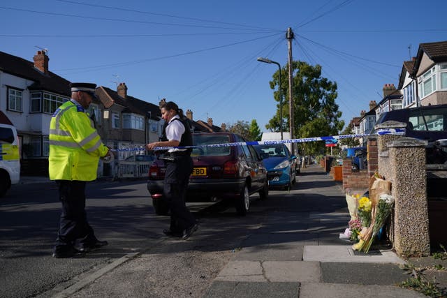 Police at a cordon near the scene on Galpin’s Road, Thornton Heath (Jonathan Brady/PA)