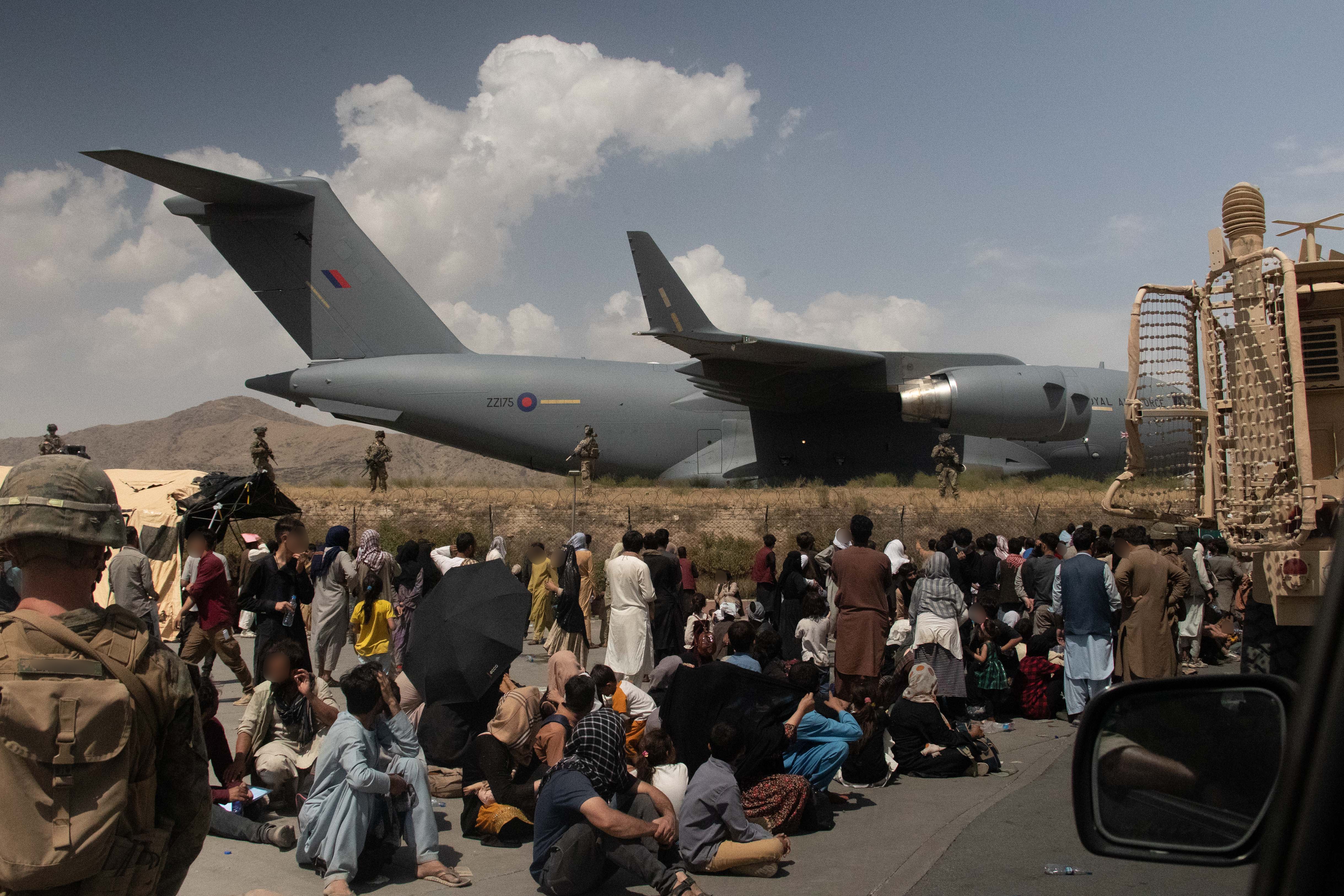 Members of the UK armed forces taking part in the evacuation at Kabul airport last August