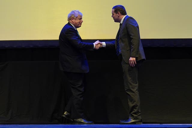 Prime Minister Boris Johnson, left, with Scottish Conservative leader Douglas Ross (PA)