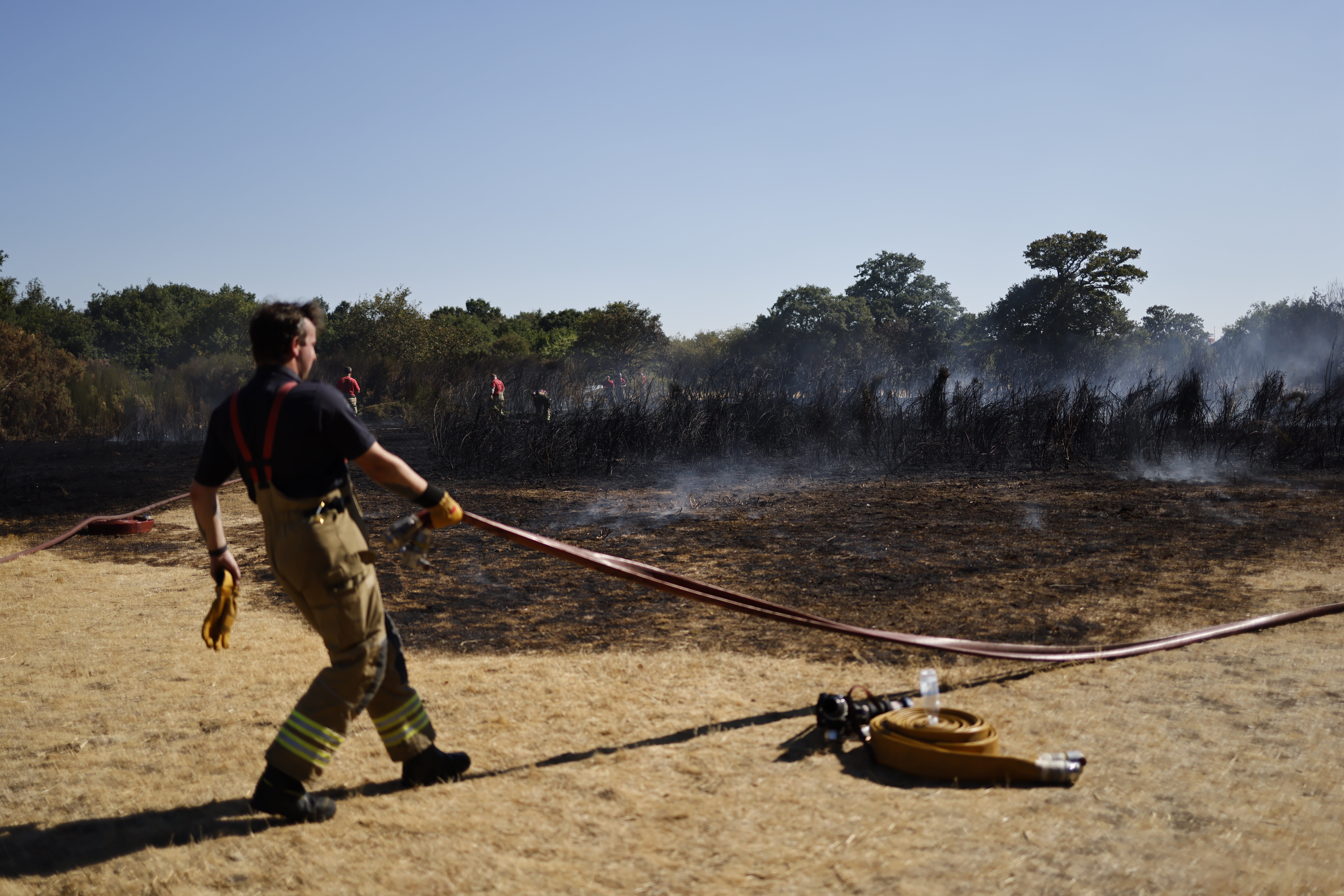 Firefighters have been tackling wildfires due to the extremely dry conditions