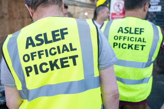 Aslef members at a picket line at Willesden Junction station in London (Dominic Lipinski/PA)