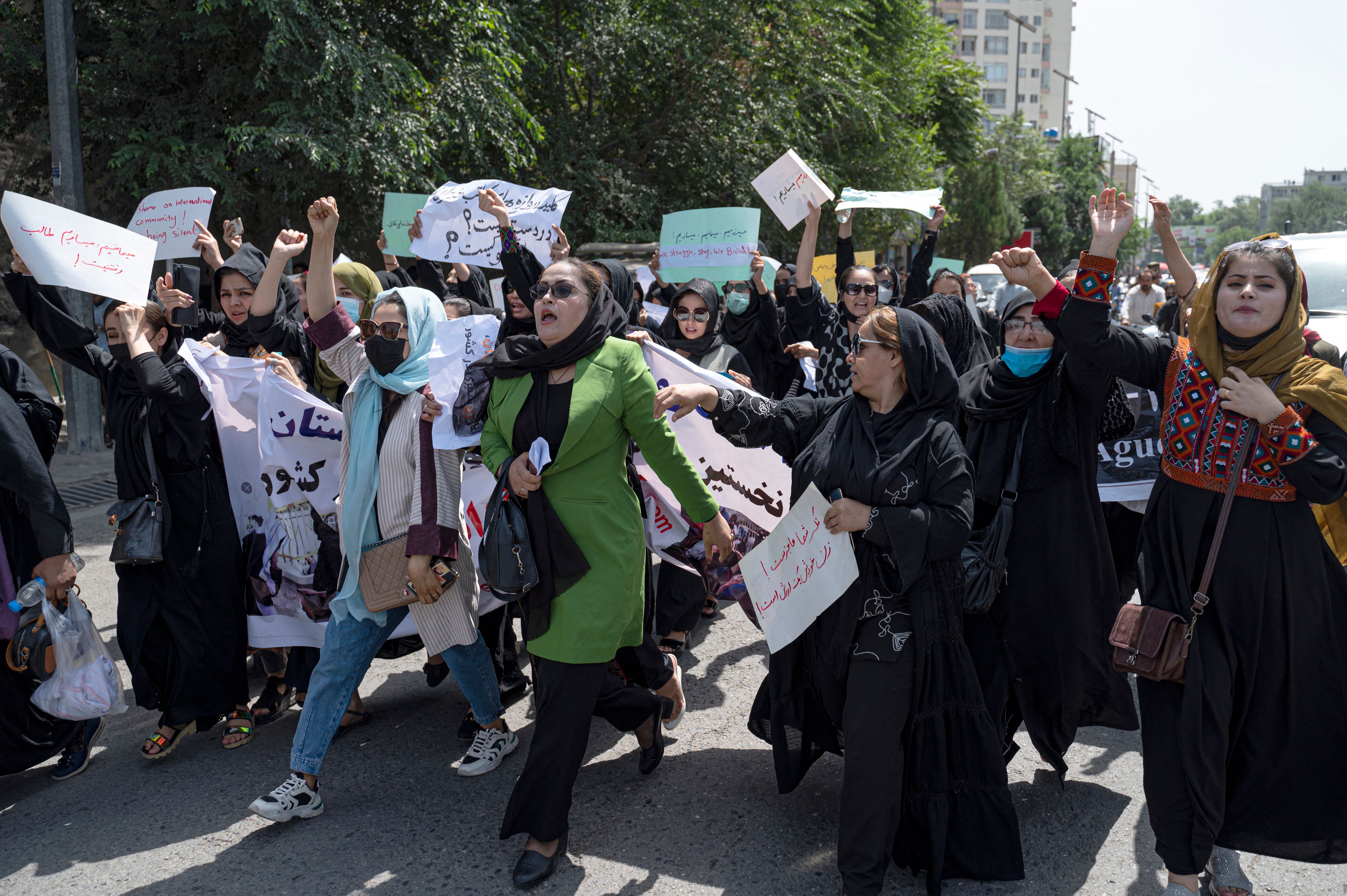 Around 40 women marched in front of the education ministry building in the capital