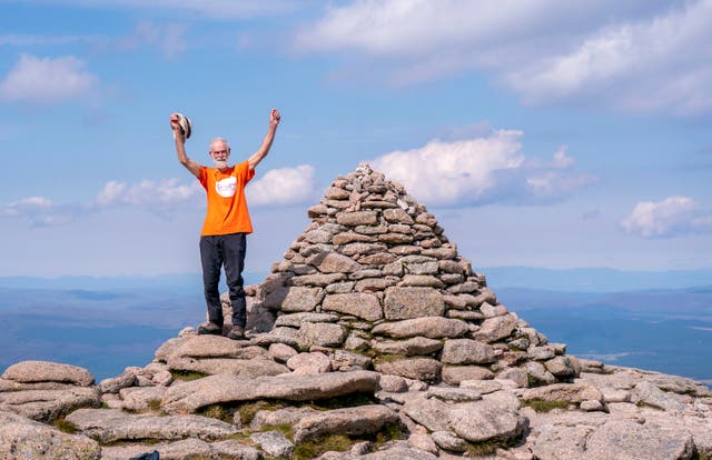 Nick Gardner reaches the top of his final mountain (Jane Barlow/PA)