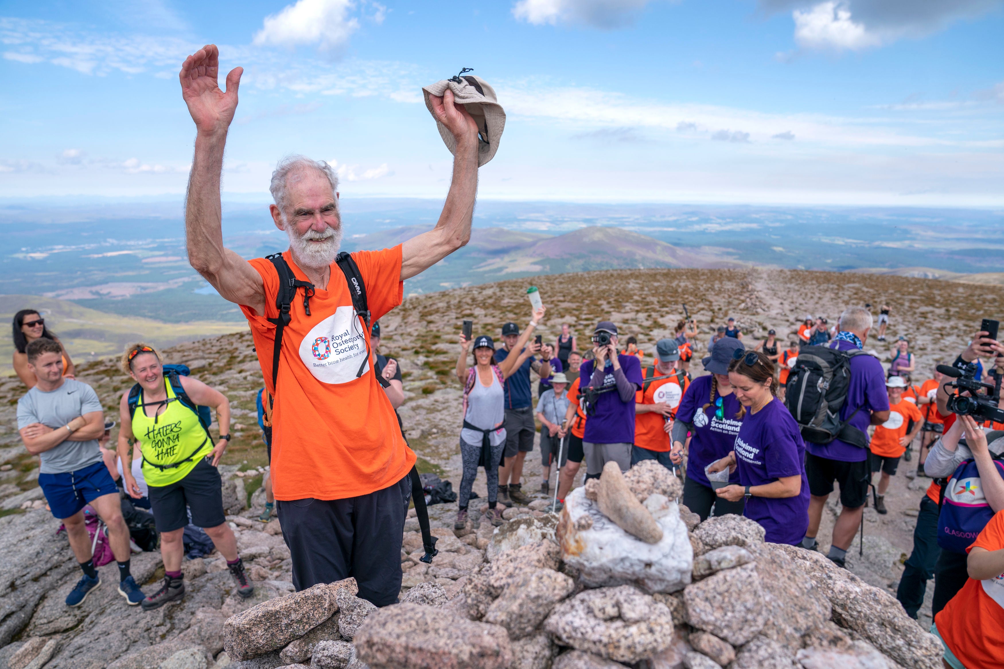 Nick Gardner, aged 82, reaches the very top of his final mountain the Cairn Gorm after setting the goal of climbing all 282 Munros in 1200 days following his wife Janet being taken into care with Alzheimer’s and osteoporosis. Picture date: Saturday August 13, 2022. PA Photo. See PA story CHARITY Munro. Photo credit should read: Jane Barlow/PA Wire