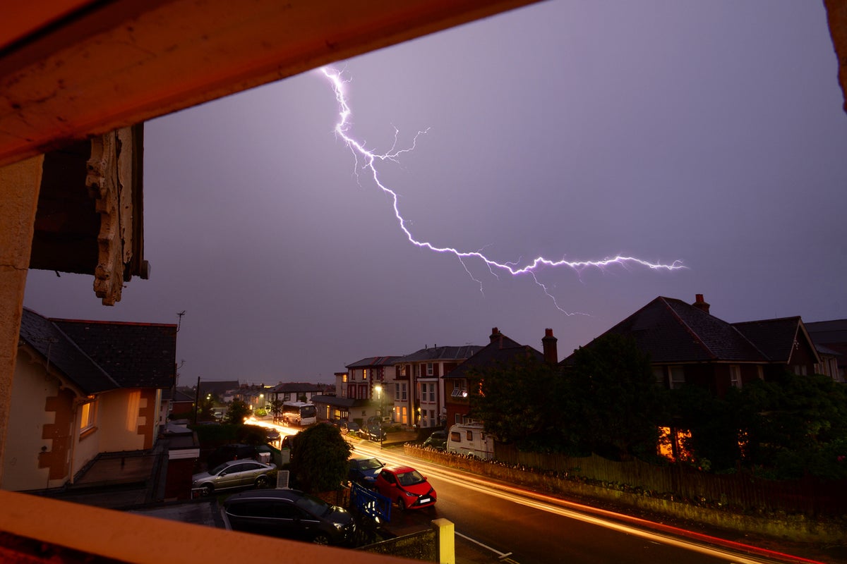 Thunderstorm warning as torrential rain to hit north of UK as heatwave continues in south