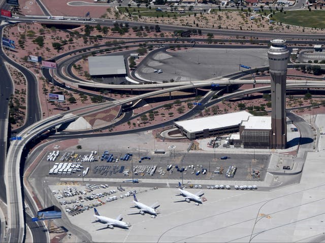<p>Harry Reid International Airport in Las Vegas, then called McCarran International, stands almost empty during the early coronavirus pandemic in May 2020</p>