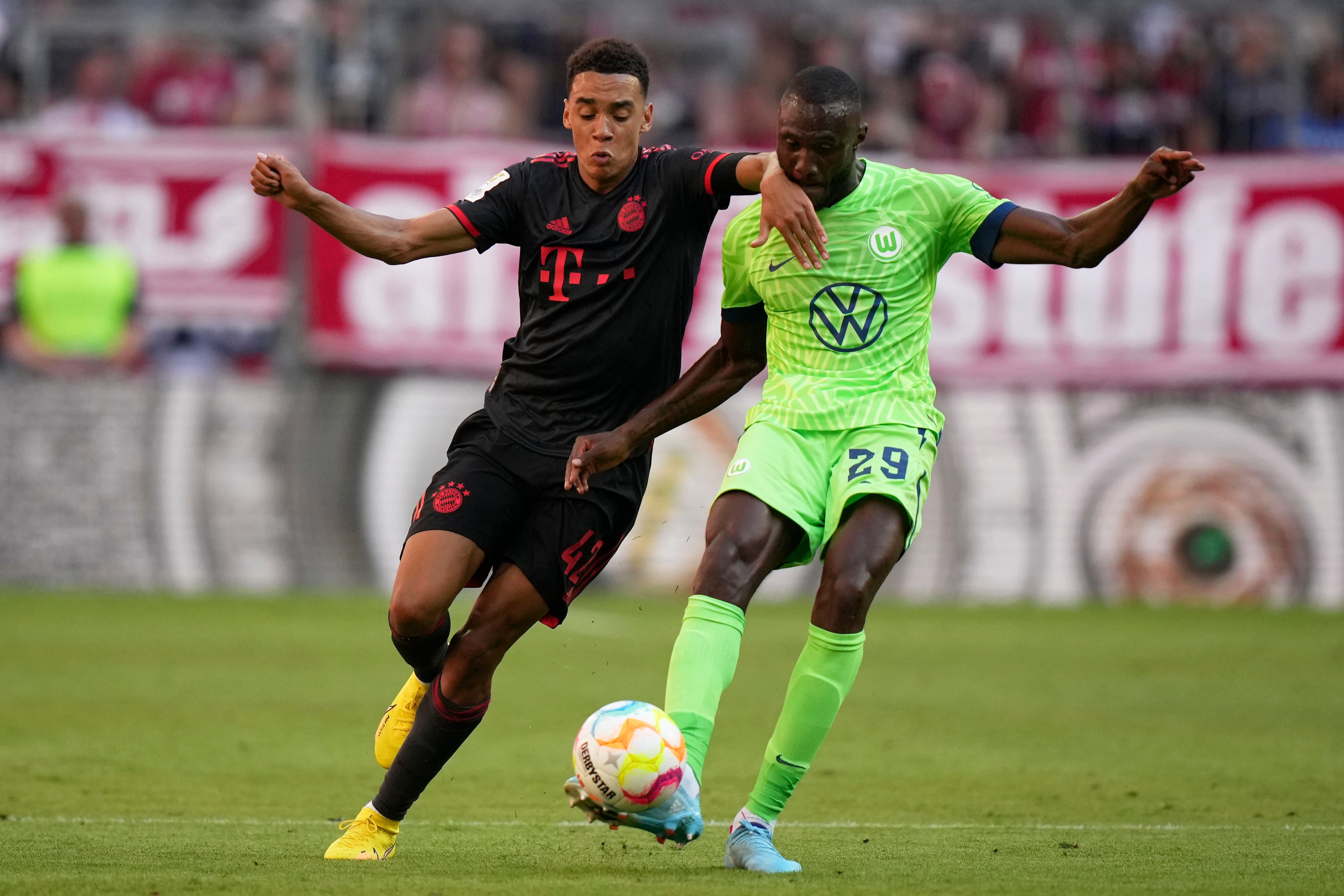Bayern’s Jamal Musiala (left) impressed in his side comfortable victory over Wolfsburg (AP Photo/Matthias Schrader)