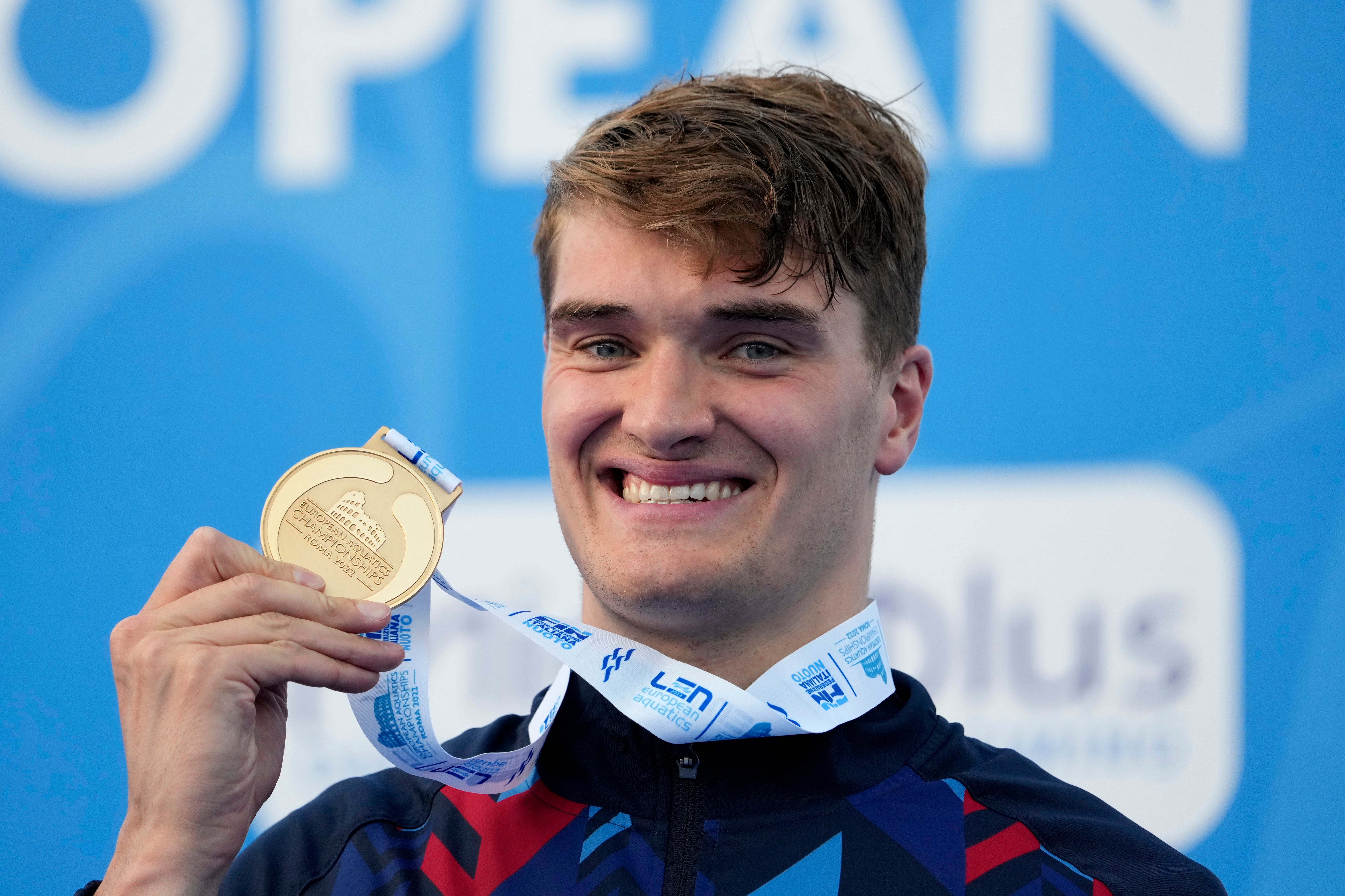 Great Britain’s James Wilby celebrates on the podium after winning gold in the men’s 200m breaststroke at the European Swimming Championships in Rome (Gregorio Borgia/AP)