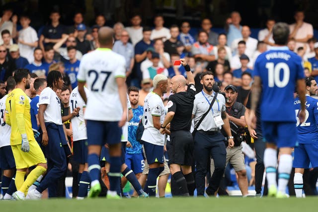 <p>Antonio Conte is shown a red card by Anthony Taylor</p>