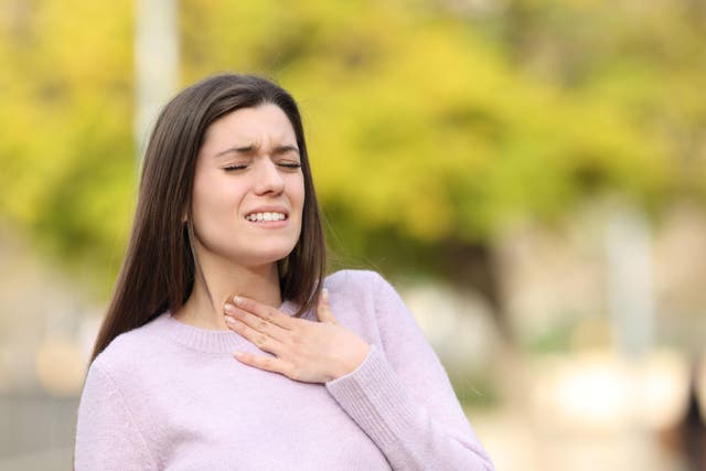 A sore throat could be the first sign of a cold (Alamy/PA)