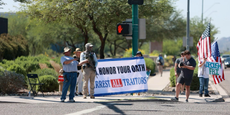 Armed Trump supporters protest outside FBI office in Phoenix