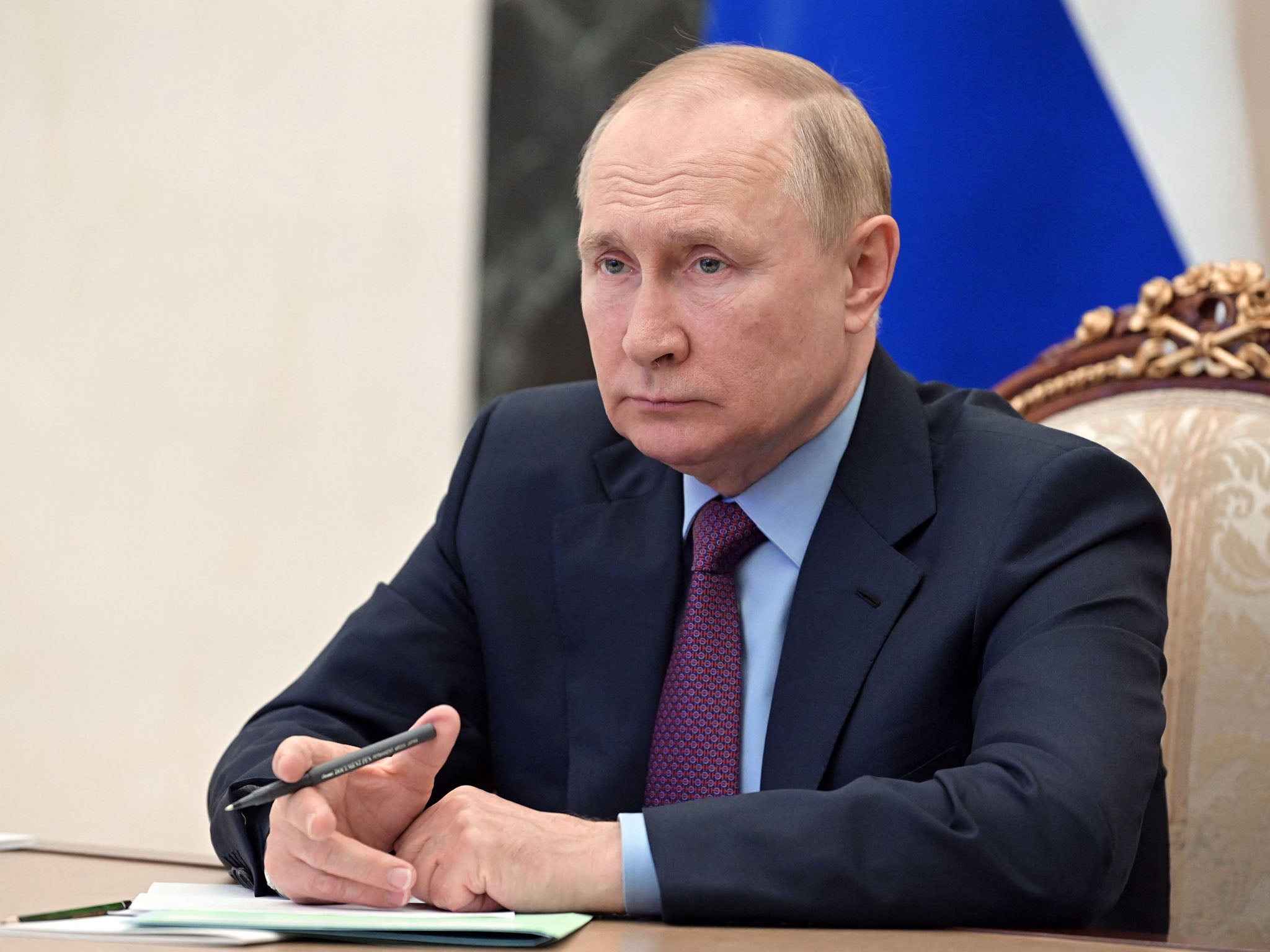 Russian President Vladimir Putin chairs a meeting in Moscow in early August