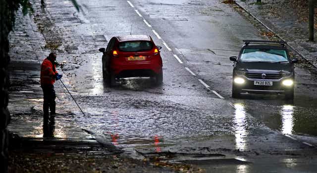 Motorists have been warned of the dangers of driving through flood water (Peter Byrne/PA)