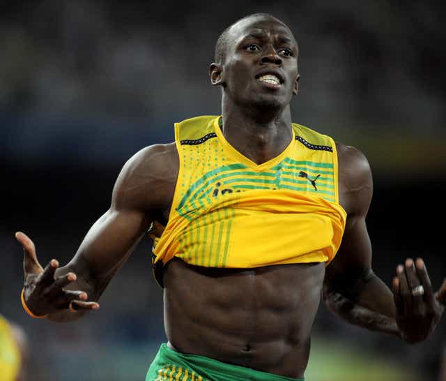 Usain Bolt celebrates his 100 metres victory in Beijing (Gareth Copley/PA)