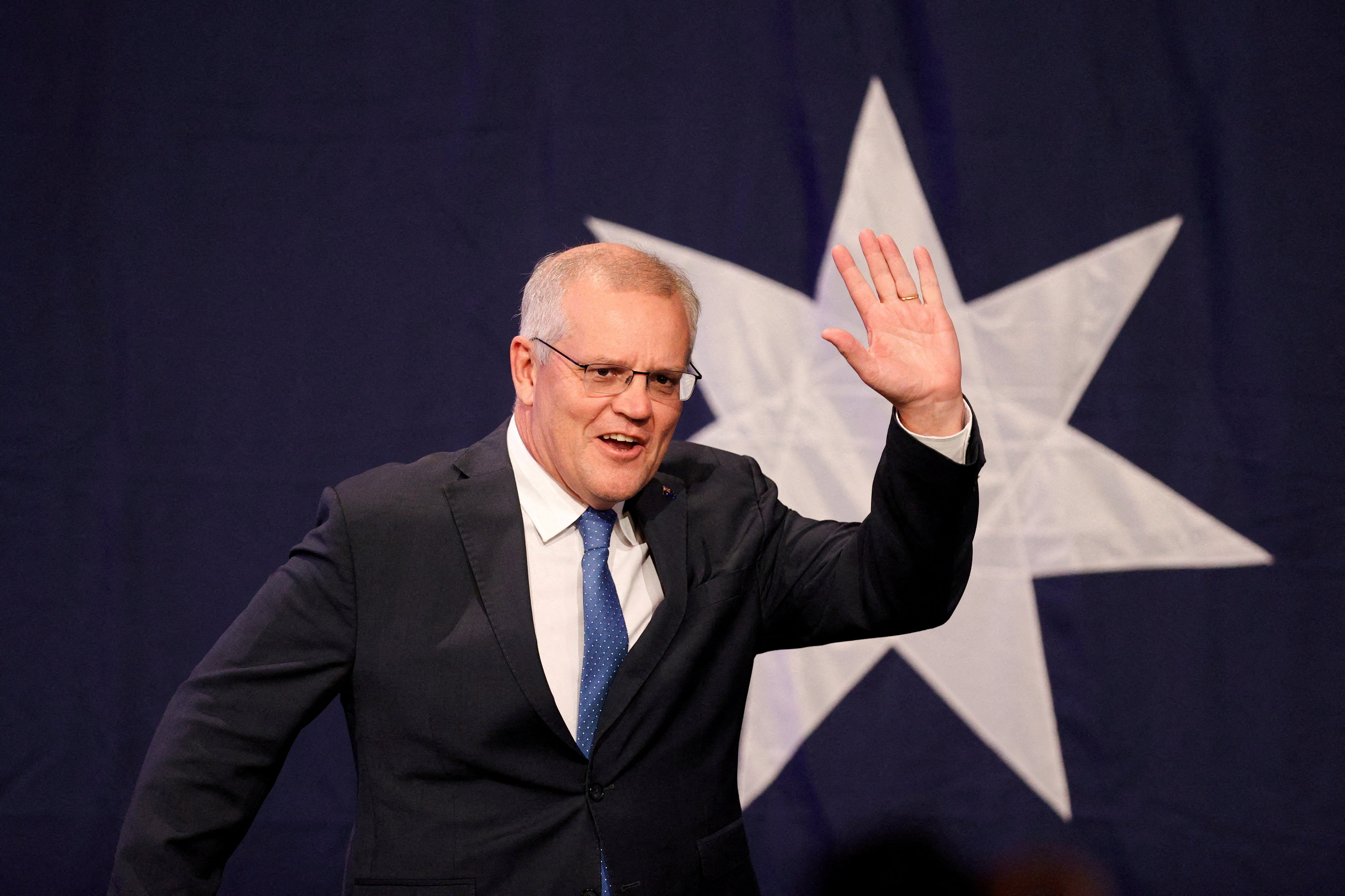 File Scott Morrison, leader of the Australian Liberal Party, arrives to address supporters in Sydney, Australia