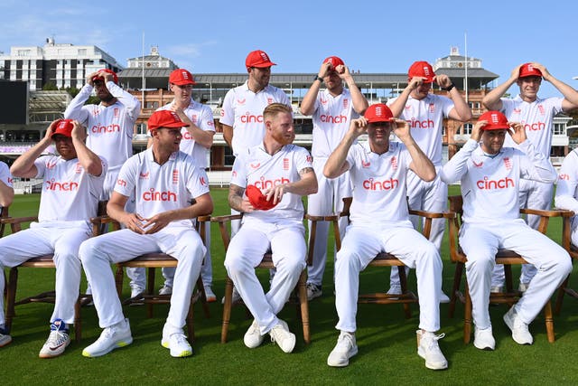 <p>The England players wearing their 'Red for Ruth’ caps</p>