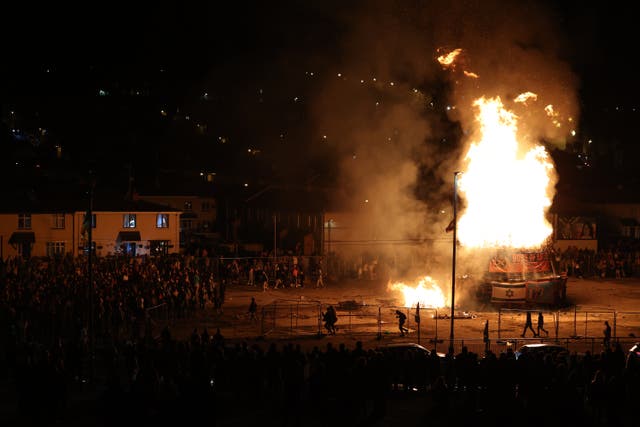People gather at a nationalist bonfire in Londonderry (Liam McBurney/PA)