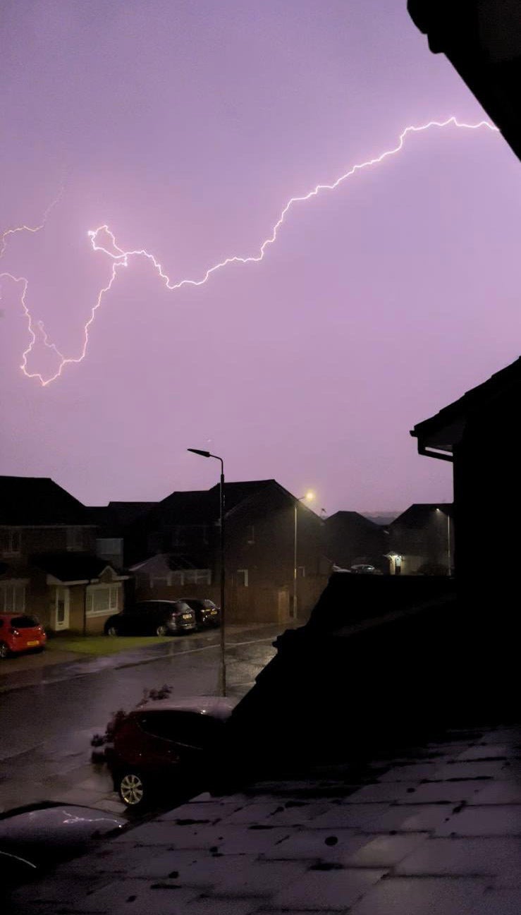 Lightning striking across Wishaw, North Lanarkshire, as the UK braces for days of rain (Zac Kennedy/PA)