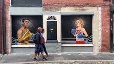 Liz Truss and Rishi Sunak painted as caricature boxers in Belfast mural