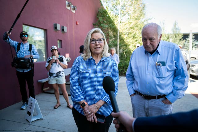 <p>Liz Cheney arrives, with her father, former Vice President Dick Cheney, to vote at the Teton County Library during the Republican primary election on Tuesday, Aug. 16, 2022, in Jackson Hole, Wyoming</p>