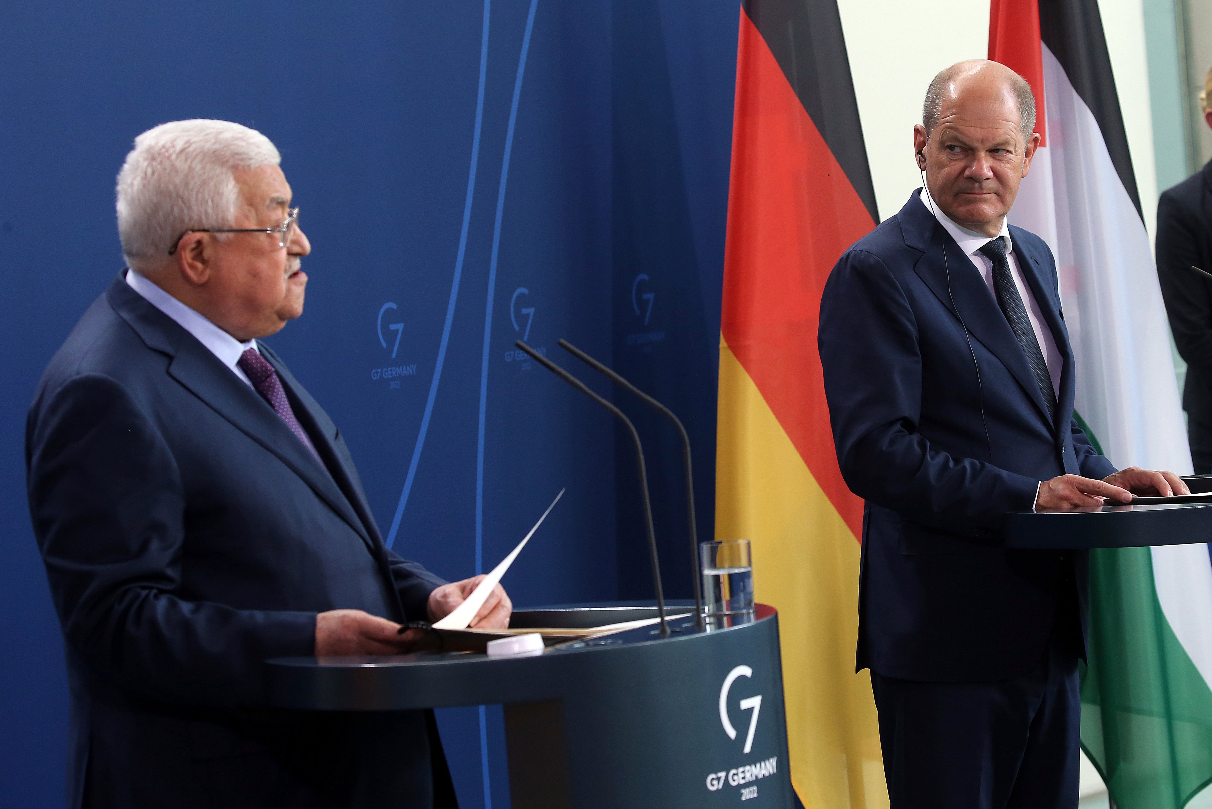 <p>Palestinian president Mahmoud Abbas (left) speaks during a news conference after a meeting with German chancellor Olaf Scholz</p>