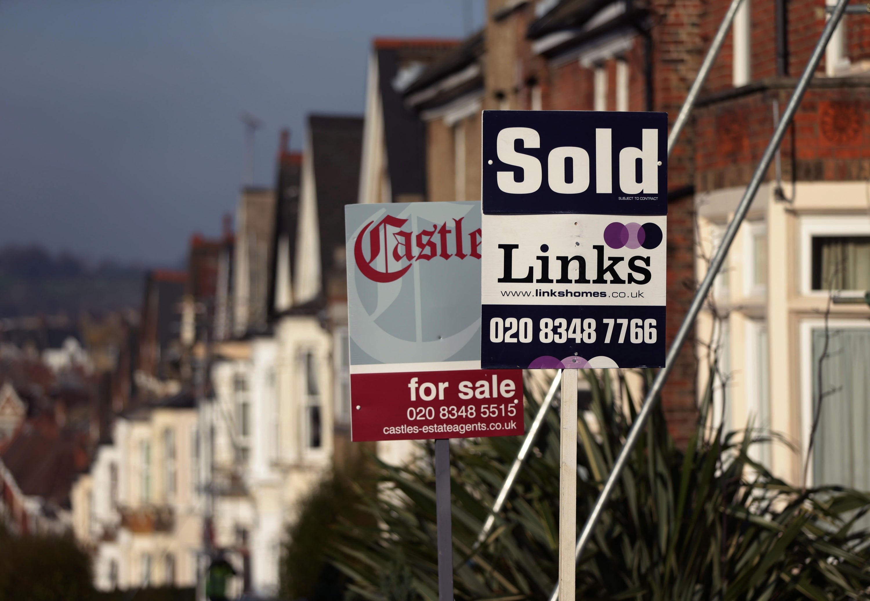 UK house prices rose by 7.8% annually in June as growth slowed sharply in the face of pressure on households and rising interest rates, new figures show (Yui Mok/PA)