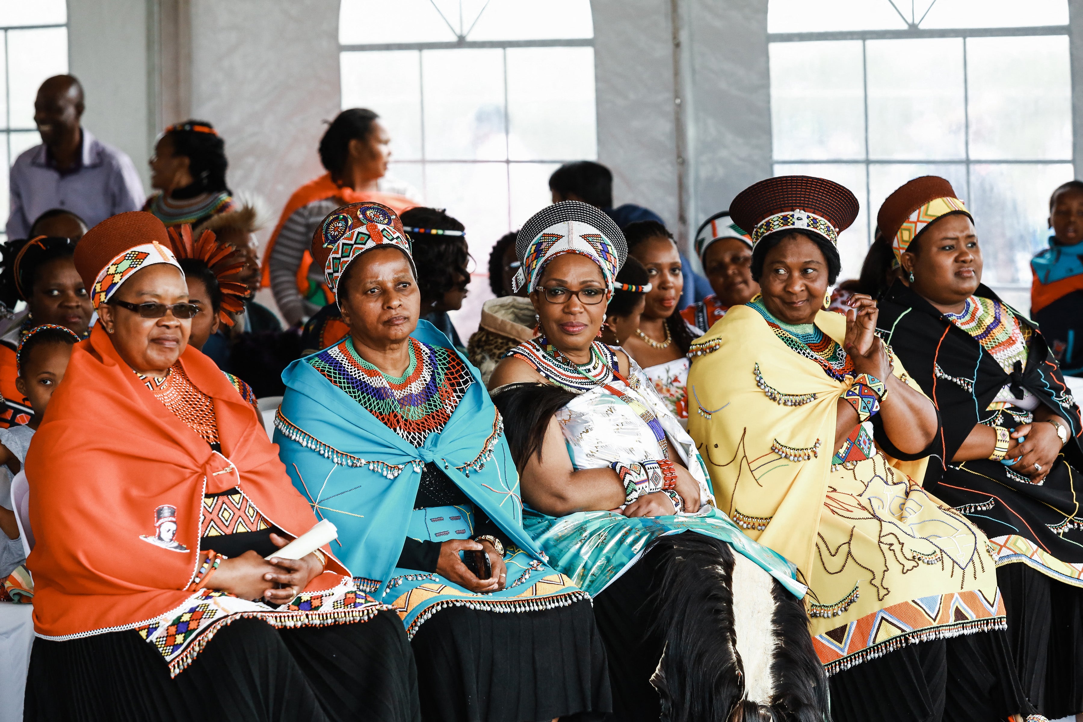 Zulu Queen Mantfombi Dlamini Zulu (third left) sits in the presence of four other wives of Zulu King Zwelithini