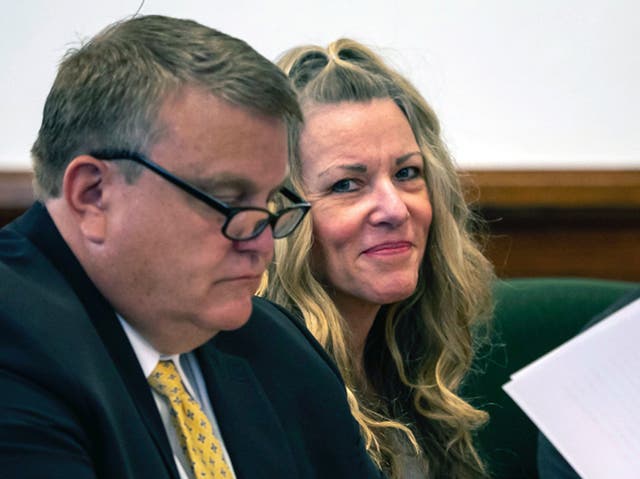 <p>Lori Vallow smiles during a court hearing in August 2022 </p>