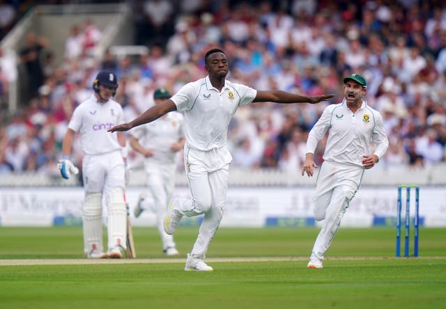 <p>Kagiso Rabada celebrates taking the wicket of Zak Crawley</p>