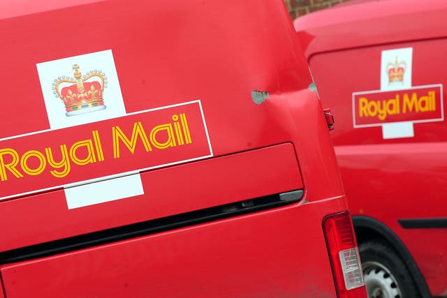 Royal Mail workers have voted to strike in a dispute over terms and conditions (Rui Vieira/PA)