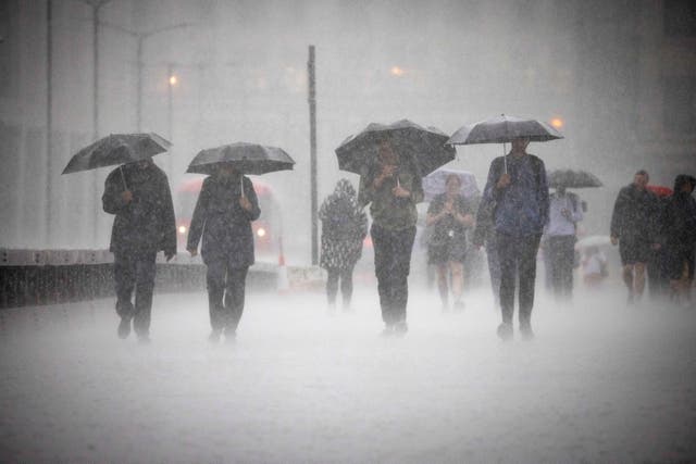 <p>Torrential downpours have battered the UK after weeks of dry weather </p>
