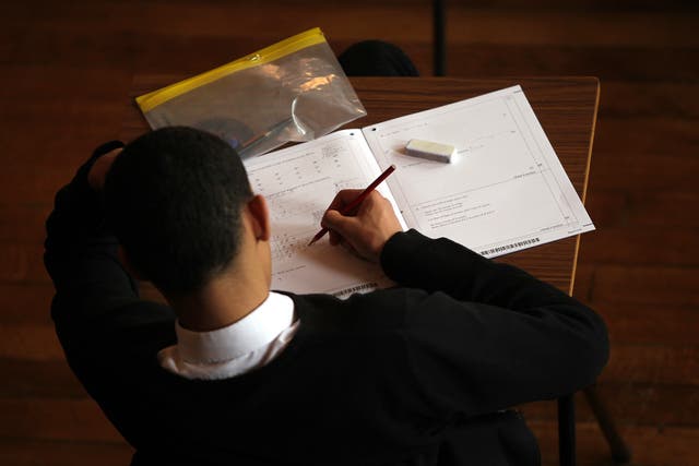 A student doing an exam (David Davies/PA)