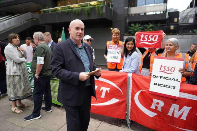 Mick Lynch, general secretary of the Rail, Maritime and Transport union, on the picket line outside London Euston train station (Stefan Rousseau/PA)