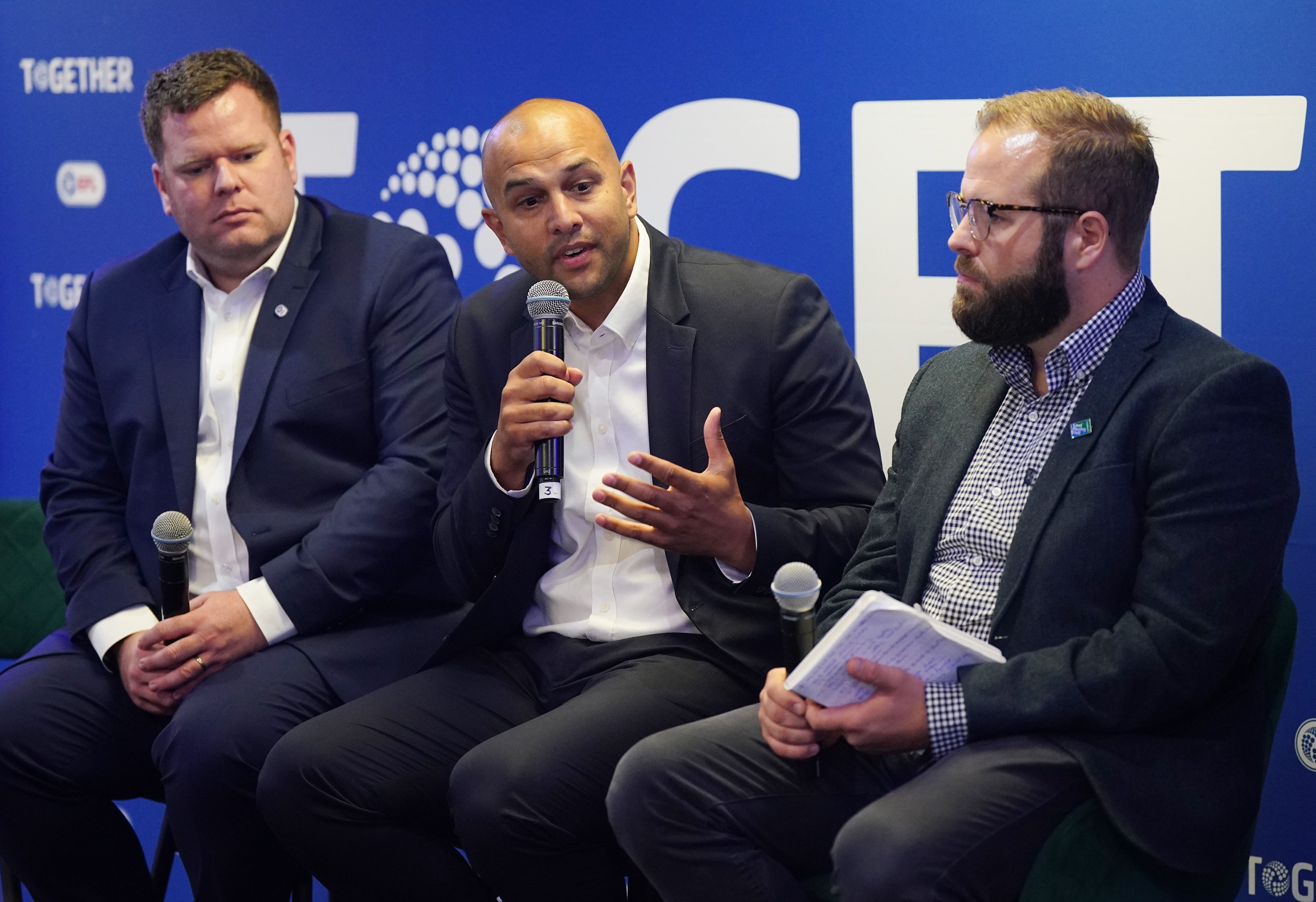 Fans for Diversity’s Anwar Uddin (centre) wants to simplify conversations in football (Yui Mok/PA)